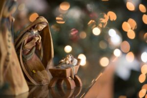 Wooden nativity scene with Christmas lights at Bronner's Christmas Wonderland.
